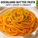 Gochujang butter pasta with scallions in a ceramic bowl